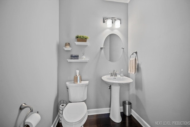 3S661 Breme Dr W, Warrenville, IL 60555 - half bathroom with baseboards and wood finished floors