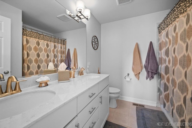 3S661 Breme Dr W, Warrenville, IL 60555 - bathroom with double vanity and tile patterned floors