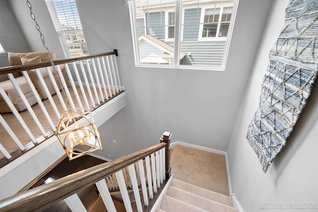 3S661 Breme Dr W, Warrenville, IL 60555 - stairway featuring a chandelier and carpet flooring