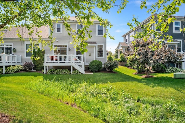 3S661 Breme Dr W, Warrenville, IL 60555 - back of house featuring a lawn and a deck