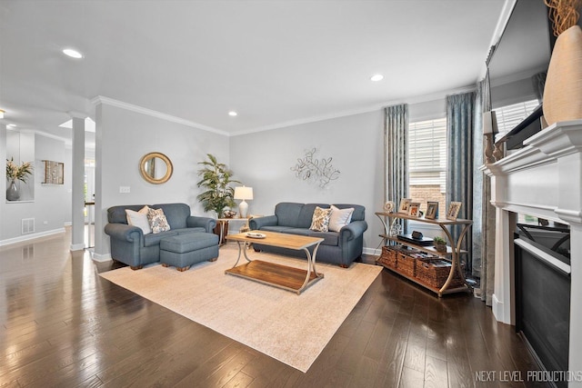 3S661 Breme Dr W, Warrenville, IL 60555 - living room featuring ornamental molding, decorative columns, dark wood-style flooring, recessed lighting, and a fireplace