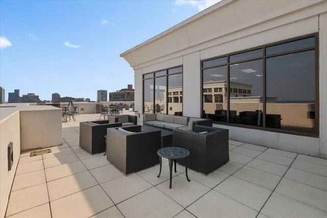 1322 S Prairie Ave Unit 406, Chicago, IL 60605 - view of patio / terrace with an outdoor living space, a city view, and outdoor dining area