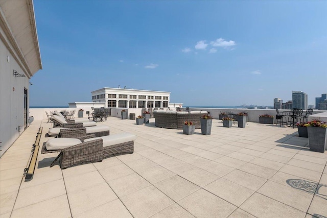 1322 S Prairie Ave Unit 406, Chicago, IL 60605 - view of patio with an outdoor living space and a water view