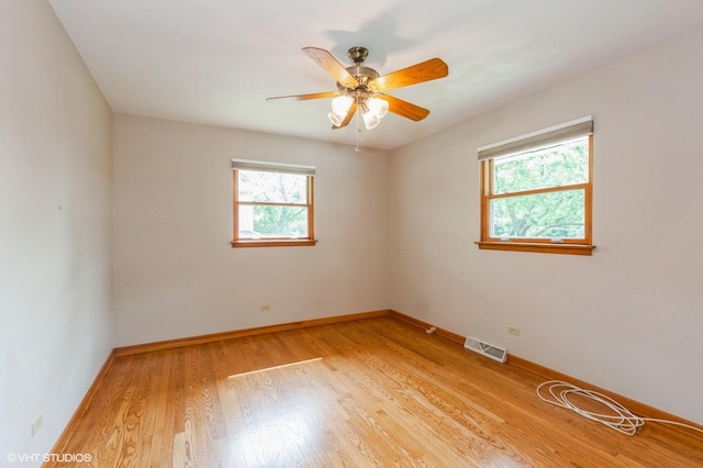 25W251 Highview Dr, Naperville, IL 60563 - unfurnished room with light wood finished floors and ceiling fan