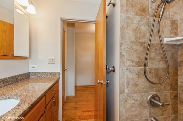 25W251 Highview Dr, Naperville, IL 60563 - full bath with vanity, wood finished floors, and washtub / shower combination