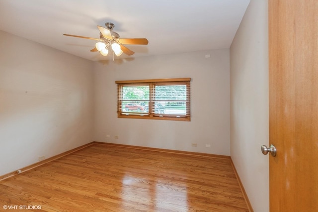 25W251 Highview Dr, Naperville, IL 60563 - spare room featuring light wood-style floors and a ceiling fan