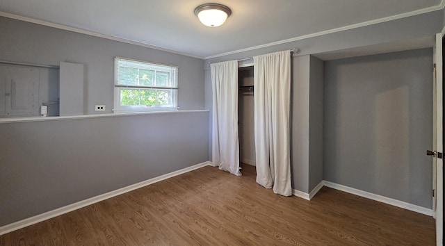 549 E Lincoln St, Palatine, IL 60074 - unfurnished bedroom with wood finished floors and ornamental molding