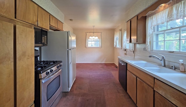 549 E Lincoln St, Palatine, IL 60074 - kitchen featuring gas range, black microwave, a chandelier, dishwasher, and light countertops
