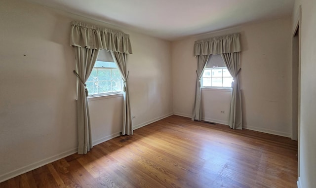 549 E Lincoln St, Palatine, IL 60074 - unfurnished room featuring wood finished floors and baseboards