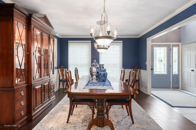 1860 Haverford Dr, Algonquin, IL 60102 - dining room featuring a chandelier, dark wood-style floors, wainscoting, and ornamental molding