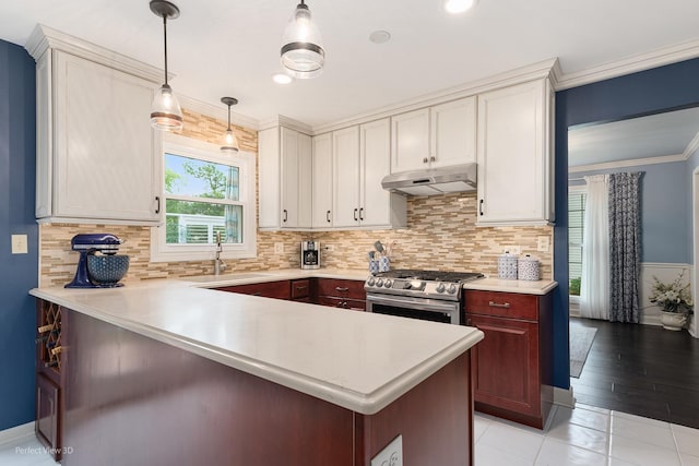 1860 Haverford Dr, Algonquin, IL 60102 - kitchen with stainless steel gas range oven, under cabinet range hood, light countertops, and a peninsula