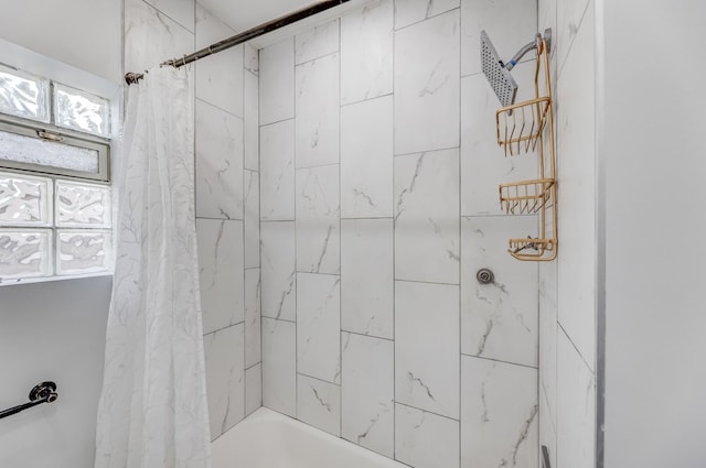 full bathroom with shower / bath combo with shower curtain