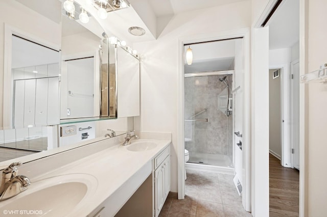 1770 Overland Trl, Deerfield, IL 60015 - full bath featuring double vanity, a stall shower, and tile patterned floors