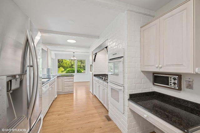 1770 Overland Trl, Deerfield, IL 60015 - kitchen featuring white appliances and light wood-style floors