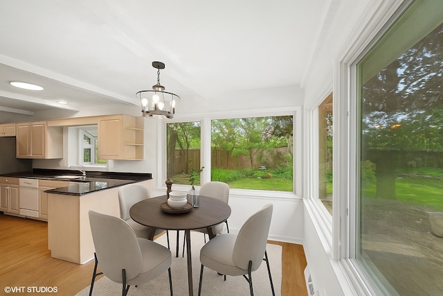 1770 Overland Trl, Deerfield, IL 60015 - dining area with plenty of natural light, light wood-style floors, and a chandelier