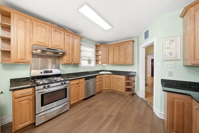 5010 N California Ave, Chicago, IL 60625 - kitchen with open shelves, stainless steel appliances, under cabinet range hood, and light wood finished floors