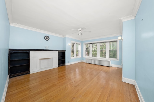 5010 N California Ave, Chicago, IL 60625 - unfurnished living room featuring radiator, ceiling fan, light wood-type flooring, and ornamental molding