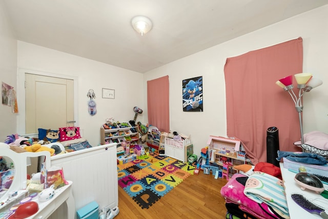 5010 N California Ave, Chicago, IL 60625 - rec room with wood finished floors