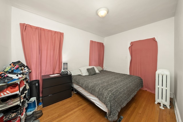 5010 N California Ave, Chicago, IL 60625 - bedroom with radiator and light wood finished floors