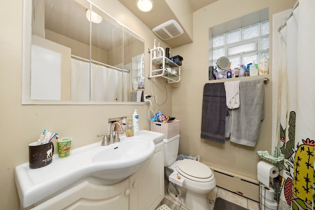 5010 N California Ave, Chicago, IL 60625 - full bathroom featuring vanity, a baseboard radiator, tile patterned flooring, and curtained shower