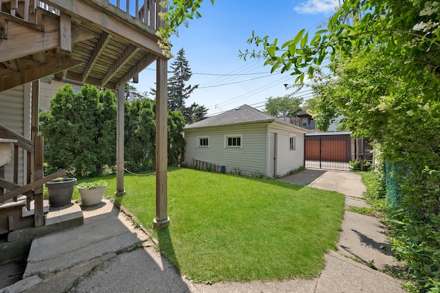 5010 N California Ave, Chicago, IL 60625 - view of green lawn with an outbuilding and a gate