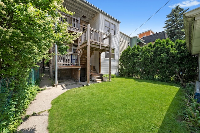 5010 N California Ave, Chicago, IL 60625 - rear view of house with a wooden deck