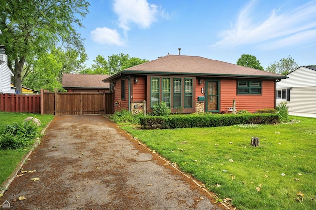 3504 Bobolink Ln, Rolling Meadows, IL 60008 - bungalow-style home featuring asphalt driveway and a gate