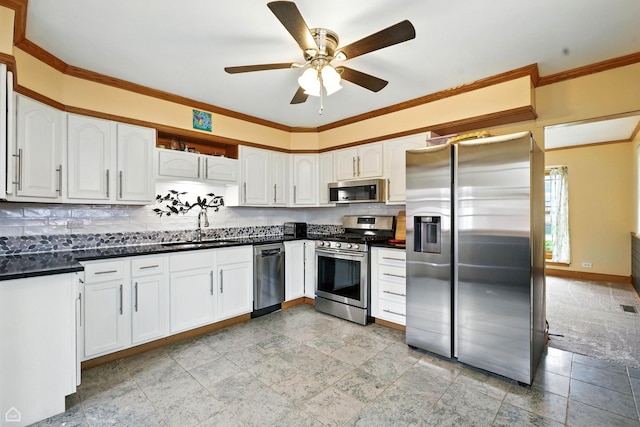 3504 Bobolink Ln, Rolling Meadows, IL 60008 - kitchen with appliances with stainless steel finishes, dark countertops, white cabinets, ceiling fan, and ornamental molding
