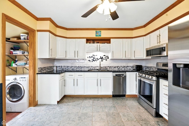 3504 Bobolink Ln, Rolling Meadows, IL 60008 - kitchen featuring appliances with stainless steel finishes, washer / clothes dryer, a ceiling fan, crown molding, and white cabinets