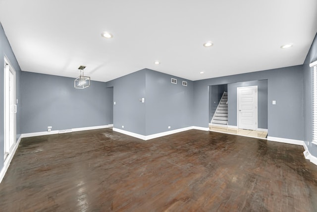 17804 Pebblewood Ln, Hazel Crest, IL 60429 - unfurnished living room with stairs, wood finished floors, and recessed lighting