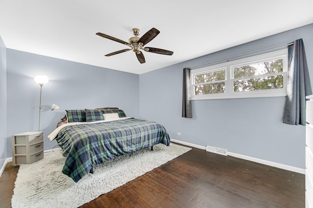 17804 Pebblewood Ln, Hazel Crest, IL 60429 - bedroom with dark wood-style flooring and ceiling fan