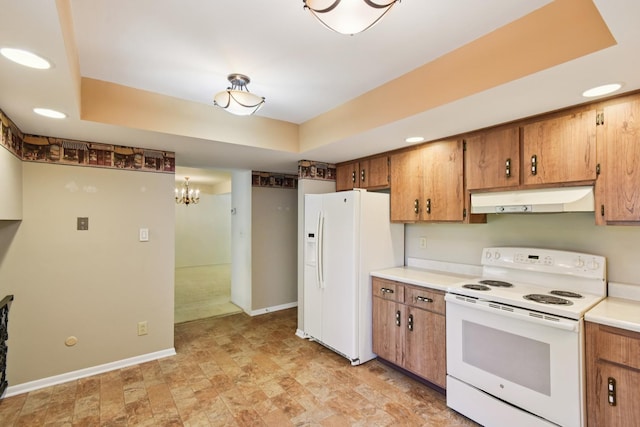 110 Meadowbrook Ln Unit 110, Morris, IL 60450 - kitchen featuring white appliances, under cabinet range hood, brown cabinetry, a chandelier, and recessed lighting