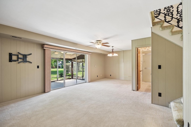 110 Meadowbrook Ln Unit 110, Morris, IL 60450 - unfurnished living room featuring carpet, a chandelier, and stairway