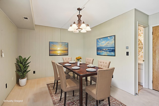 110 Meadowbrook Ln Unit 110, Morris, IL 60450 - dining area with a chandelier and light wood finished floors