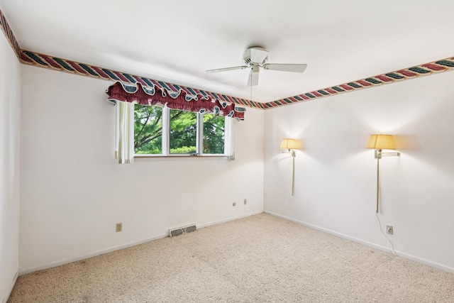 110 Meadowbrook Ln Unit 110, Morris, IL 60450 - carpeted empty room featuring a ceiling fan and baseboards