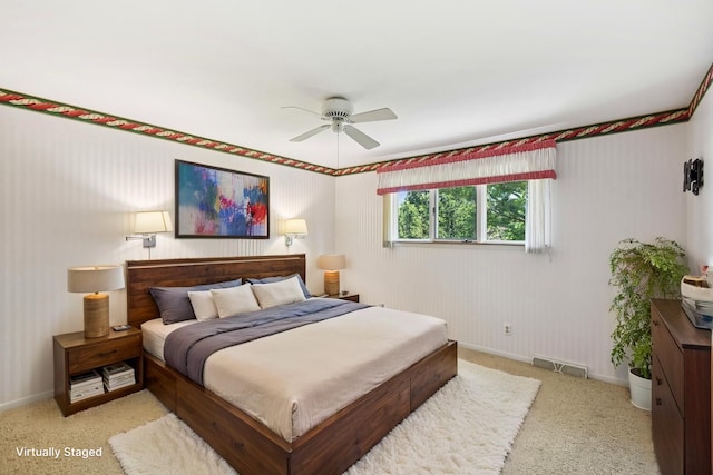 110 Meadowbrook Ln Unit 110, Morris, IL 60450 - bedroom featuring light carpet and ceiling fan