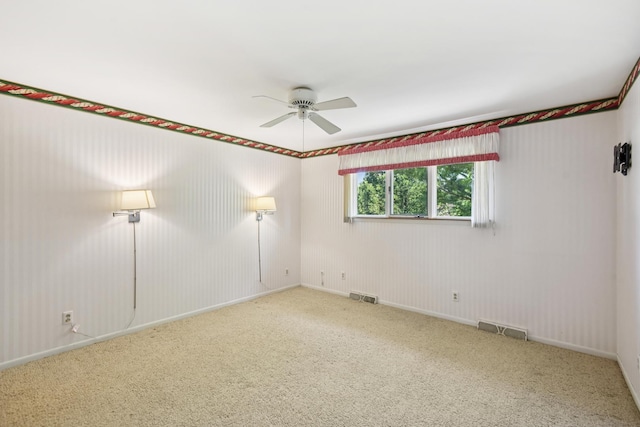 110 Meadowbrook Ln Unit 110, Morris, IL 60450 - spare room featuring carpet and a ceiling fan