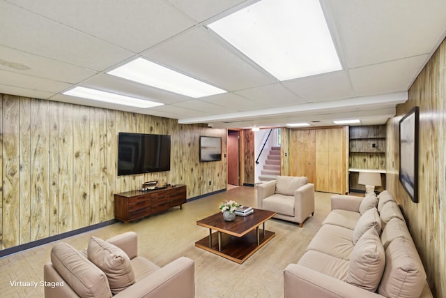 110 Meadowbrook Ln Unit 110, Morris, IL 60450 - living area with a paneled ceiling, wood walls, stairs, and wood finished floors