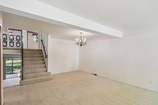 110 Meadowbrook Ln Unit 110, Morris, IL 60450 - unfurnished living room featuring carpet flooring, a chandelier, and stairway