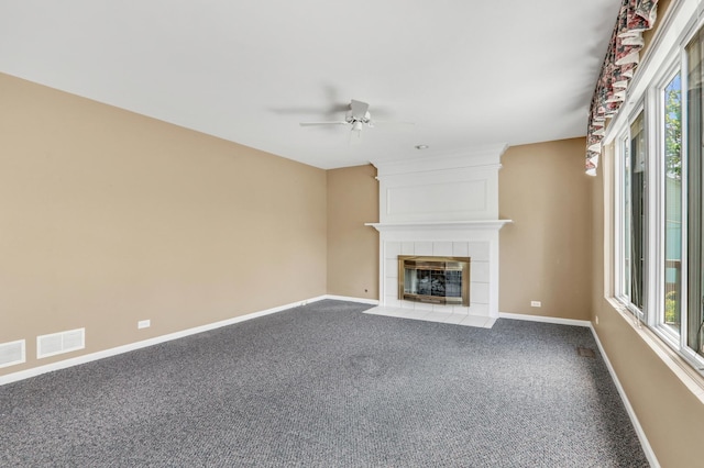 768 Fieldstone Dr, Lake Villa, IL 60046 - unfurnished living room with a ceiling fan, carpet, and a fireplace