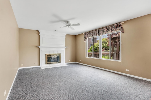 768 Fieldstone Dr, Lake Villa, IL 60046 - unfurnished living room featuring a ceiling fan, carpet floors, and a tiled fireplace