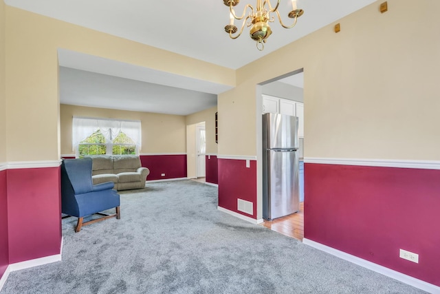 768 Fieldstone Dr, Lake Villa, IL 60046 - living area with carpet flooring and a chandelier