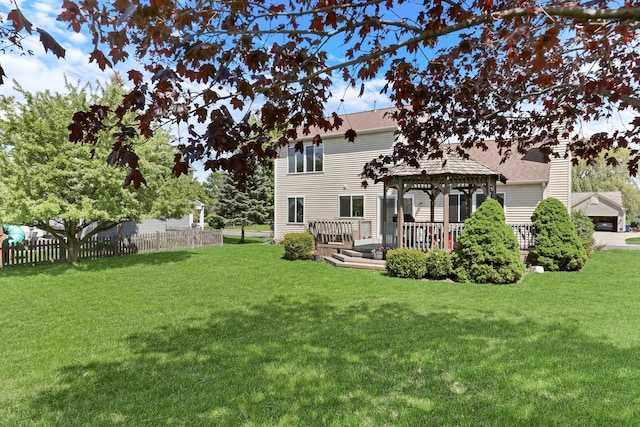 768 Fieldstone Dr, Lake Villa, IL 60046 - back of property featuring a gazebo, a deck, and a shingled roof