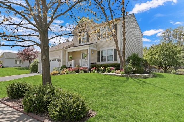 768 Fieldstone Dr, Lake Villa, IL 60046 - view of front facade featuring an attached garage, a front lawn, and driveway