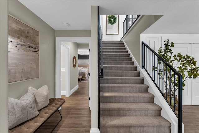 2611 Private Access 424, Mahomet, IL 61853 - staircase with wood finished floors and baseboards