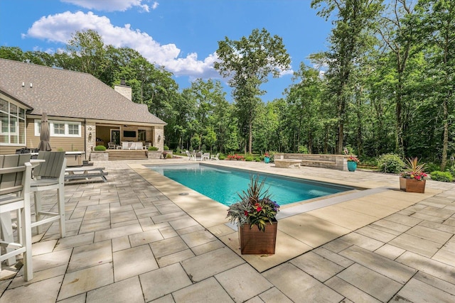 2611 Private Access 424, Mahomet, IL 61853 - outdoor pool featuring a patio area and outdoor lounge area