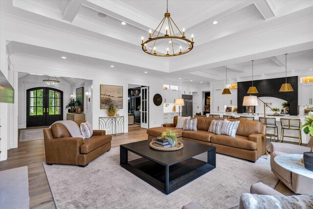 2611 Private Access 424, Mahomet, IL 61853 - living area featuring a chandelier, recessed lighting, wood finished floors, ornamental molding, and coffered ceiling