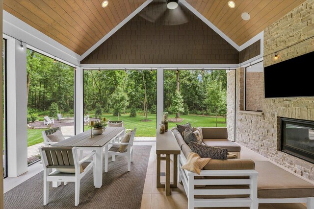 2611 Private Access 424, Mahomet, IL 61853 - view of patio with an outdoor living space with a fireplace, outdoor dining area, and a ceiling fan