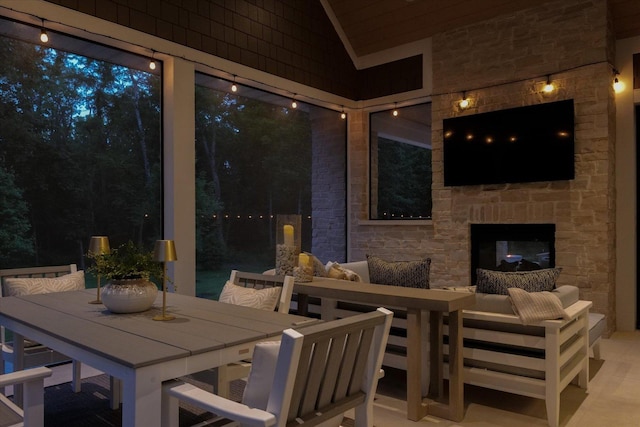 2611 Private Access 424, Mahomet, IL 61853 - view of patio featuring outdoor dining area and an outdoor living space with a fireplace