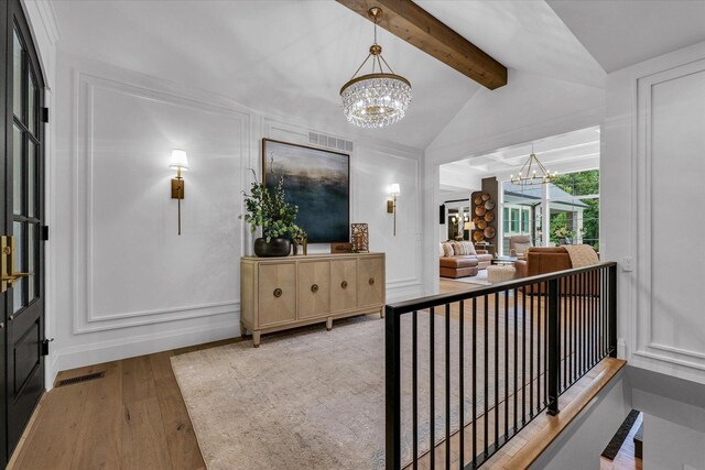 2611 Private Access 424, Mahomet, IL 61853 - foyer featuring a chandelier and hardwood / wood-style flooring